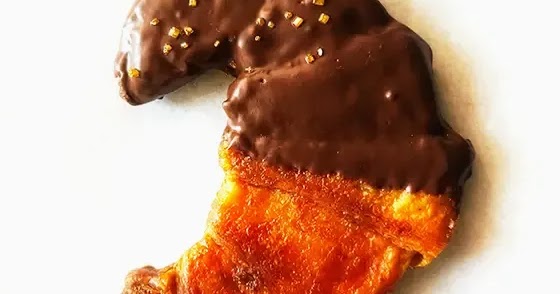 Flat Croissants Dipped in Chocolate