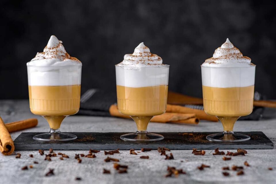 Traditional Peruvian sweet dessert called Suspiro a limeña. Creamy, caramel like pudding is topped with a Port flavored meringue and sprinkled with cinnamon