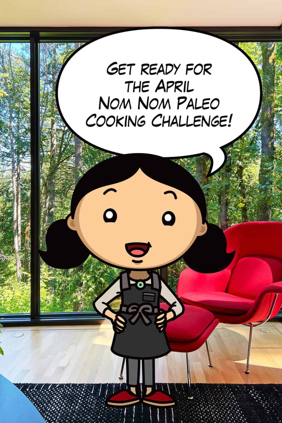 A cartoon Michelle Tam is standing in front of a red chair and a window overlooking a forest as she announces the April Nom Nom Paleo cooking challenge.